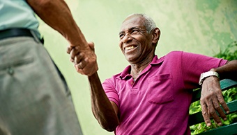 Man shaking hands while smiling in Jacksonville