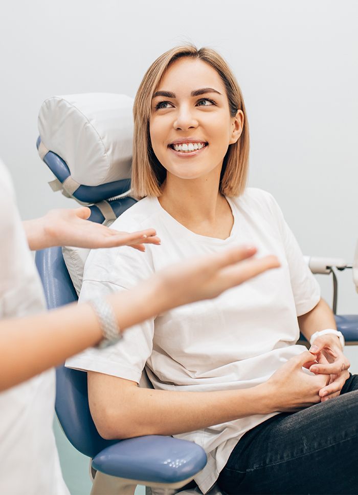 Smiling woman in dental chair