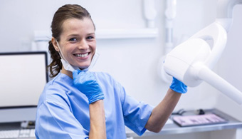 Dental hygienist smiles