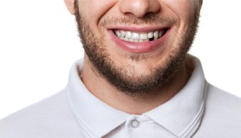 a man smiling with a missing tooth in Jacksonville