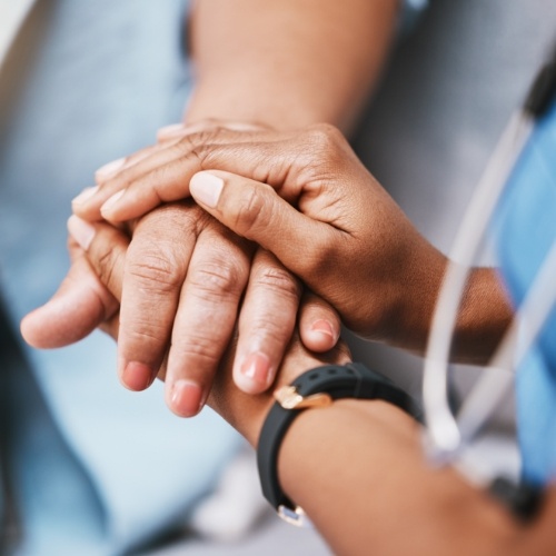 Medical provider consulting with a patient in a comfortable exam room