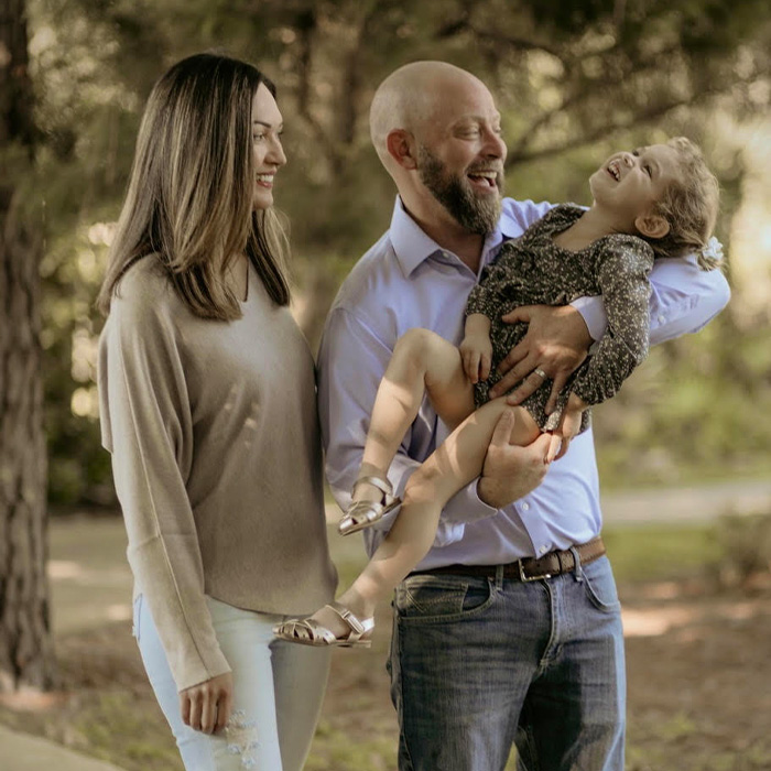 Doctor Johnson and his family outdoors