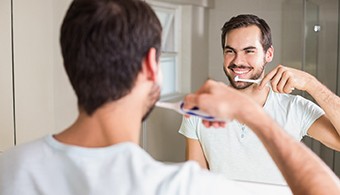 Man brushing teeth in Jacksonville