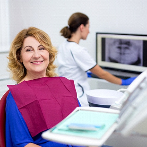 woman smiling in dental chair