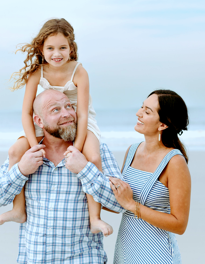 Jacksonville dentists Dr Ryan and Dr Rose with their daughter