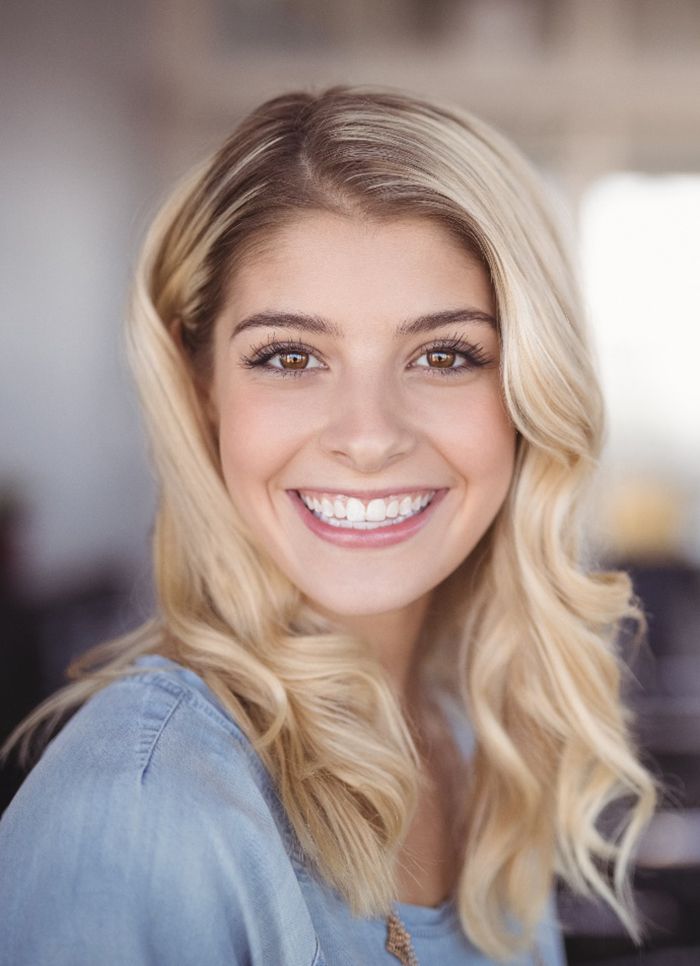 Blonde woman smiling after Invisalign in Jacksonville, FL