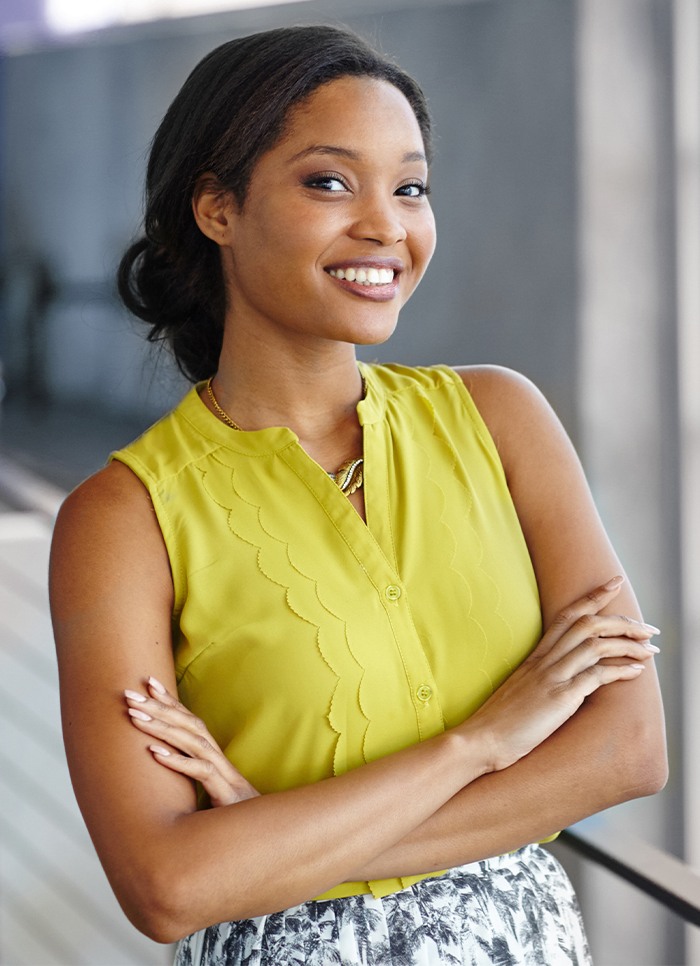 Woman with healthy smile after preventive dentistry