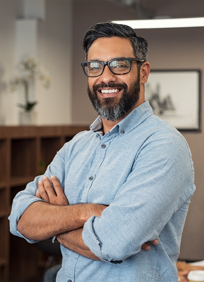 Man with healthy smile after visiting the dentist