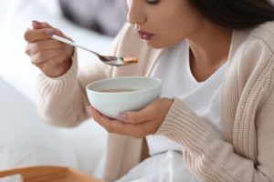 eating chicken broth