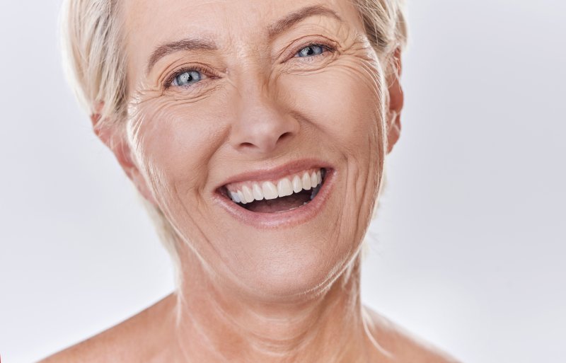 smiling senior wearing dentures