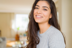 a person smiling after receiving cosmetic dentistry