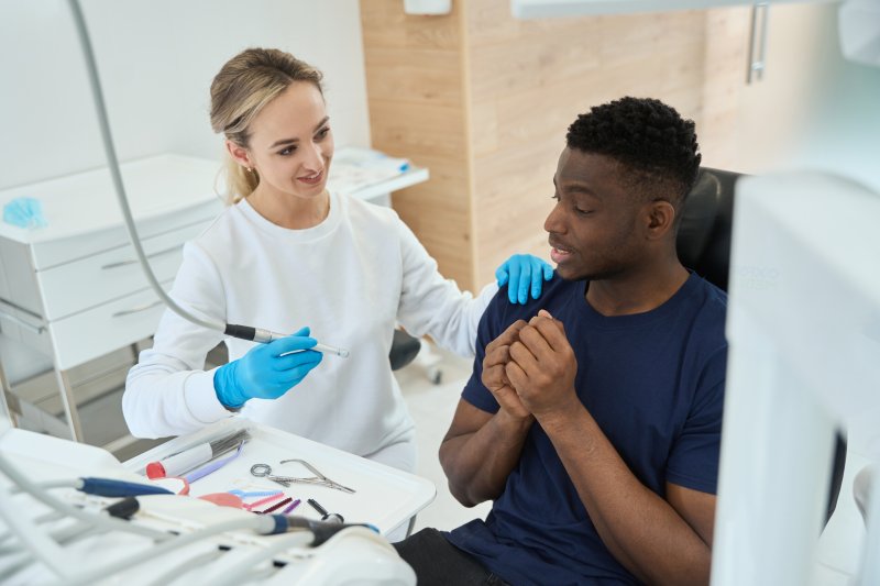 young man feeling apprehensive at the dentist’s office